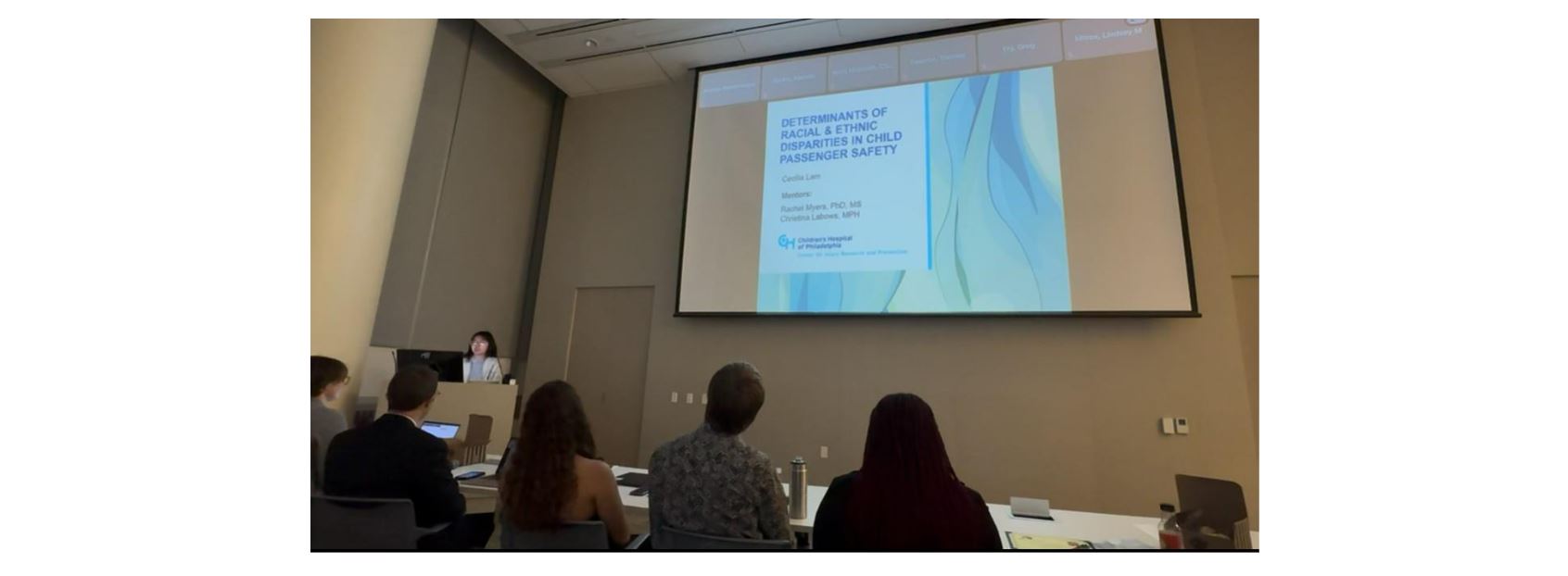 Cecilia giving a research presentation