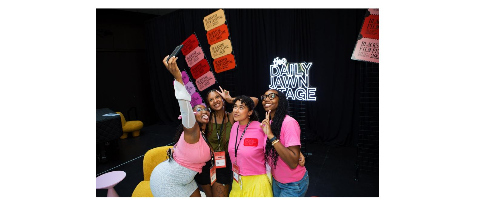 Jourdan taking a selfie with other BlackStar staff at the festival