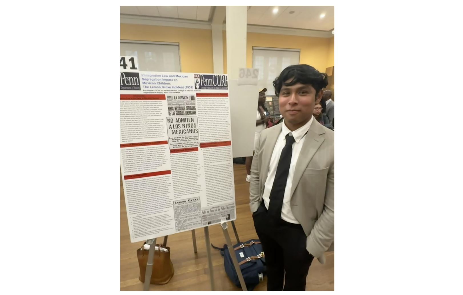 Eric presenting his research poster at the Fall Expo