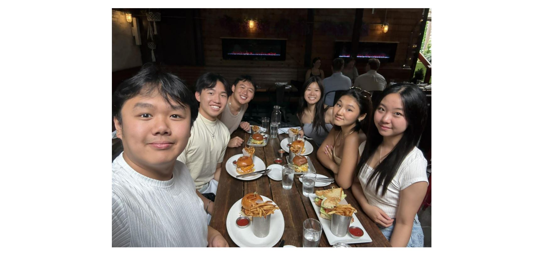 Kevin at dinner with friends and coworkers