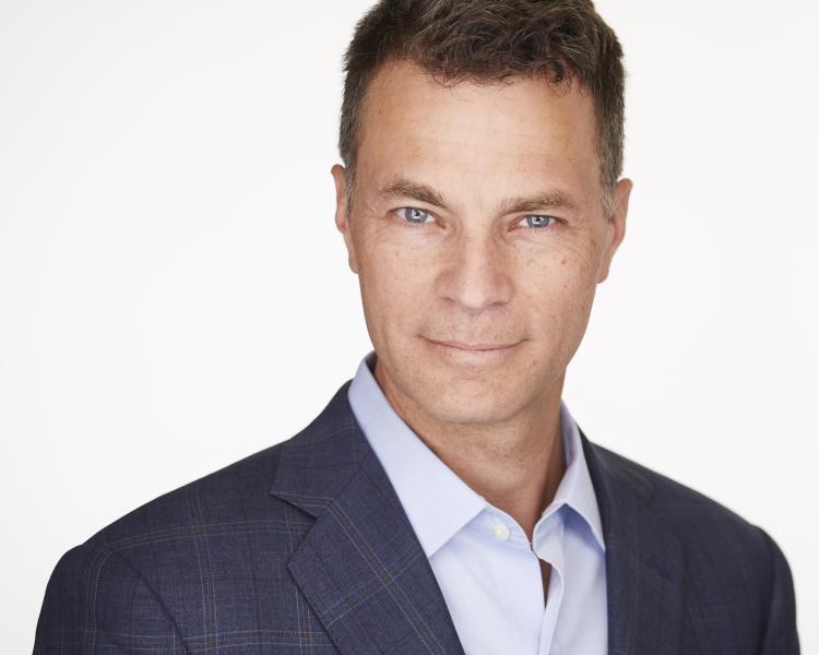 Headshot photo of Geoff Aguirre